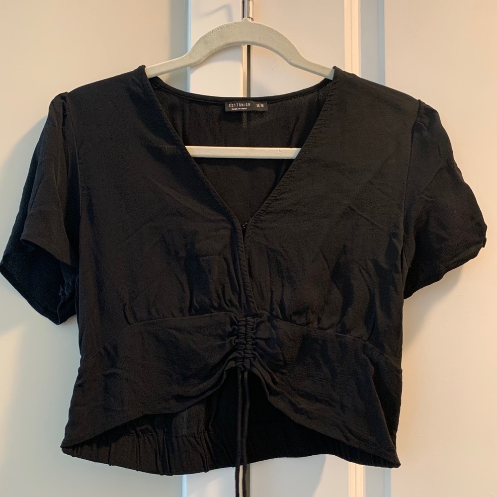 Cotton on black shirt